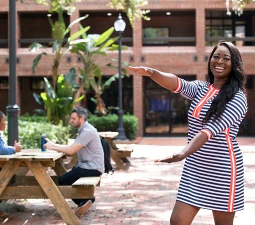 gator clap a woman doing gator clapping in campus