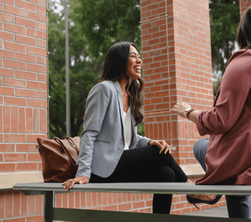 2021-06-23_Levin College of Law_0685 students sitting on the bench and talking