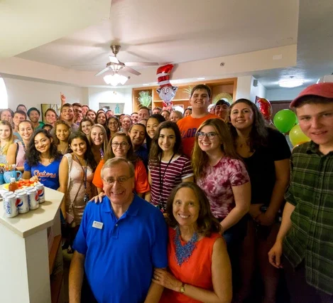 President Fuchs with Students at Jennings Hall in Fall 2017