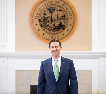 President Sasse in front of University Seal President Ben Sasse in front of University Seal