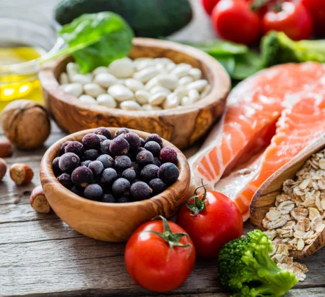 Berries, tomatoes, salmon, and other healthy food item. 