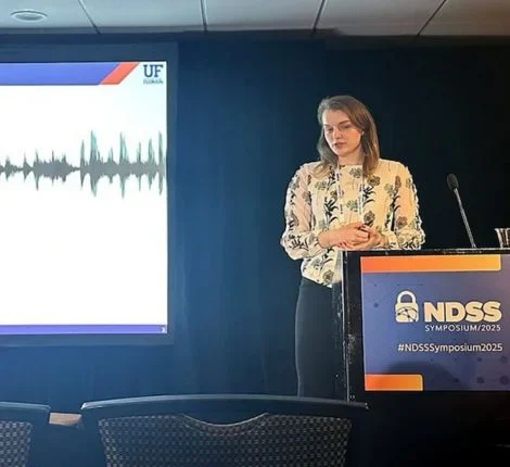 A researcher stands at a podium.