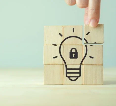 A wooden block image of a light bulb